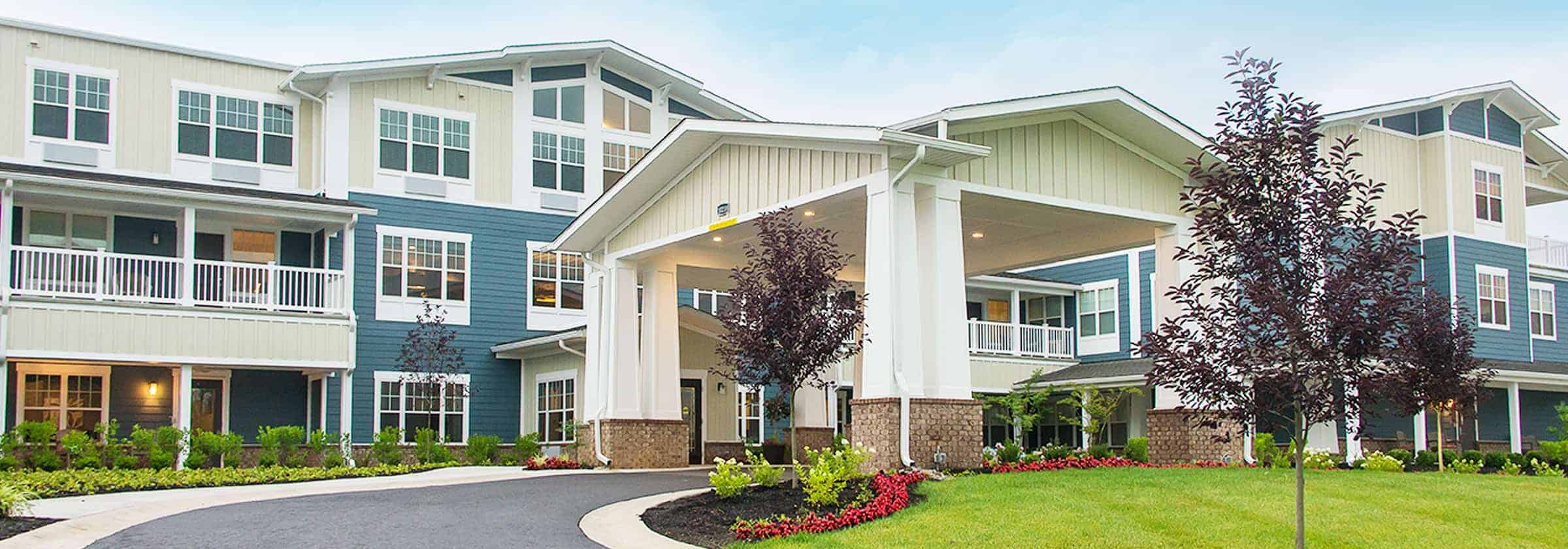 Front view of a Traditions senior living building