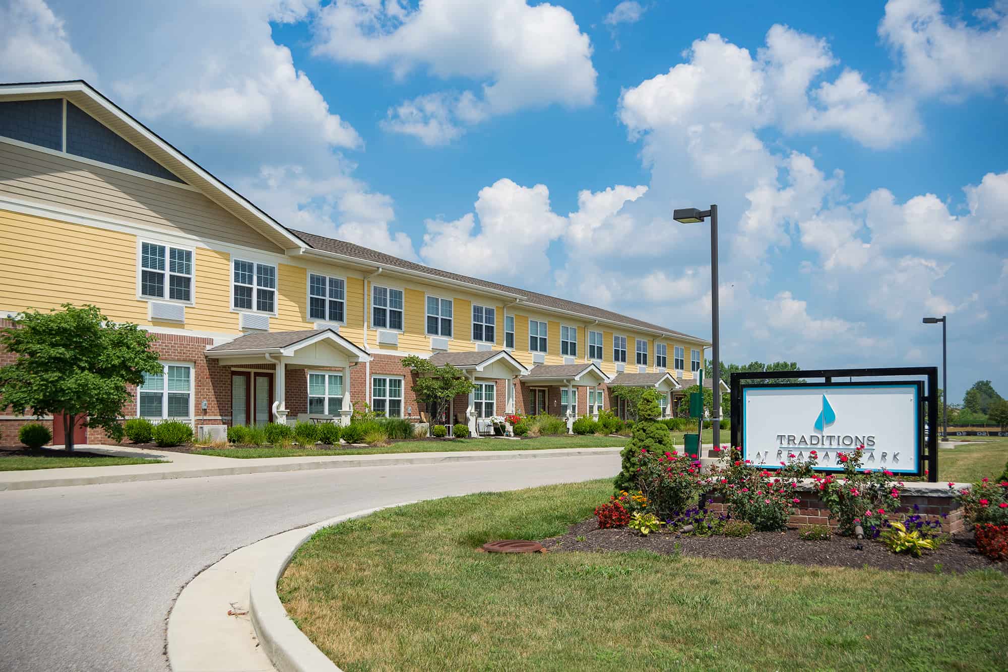 Front view of the Traditions at Reagan Park senior living community's main building
